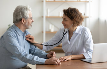 doctor checking her patient