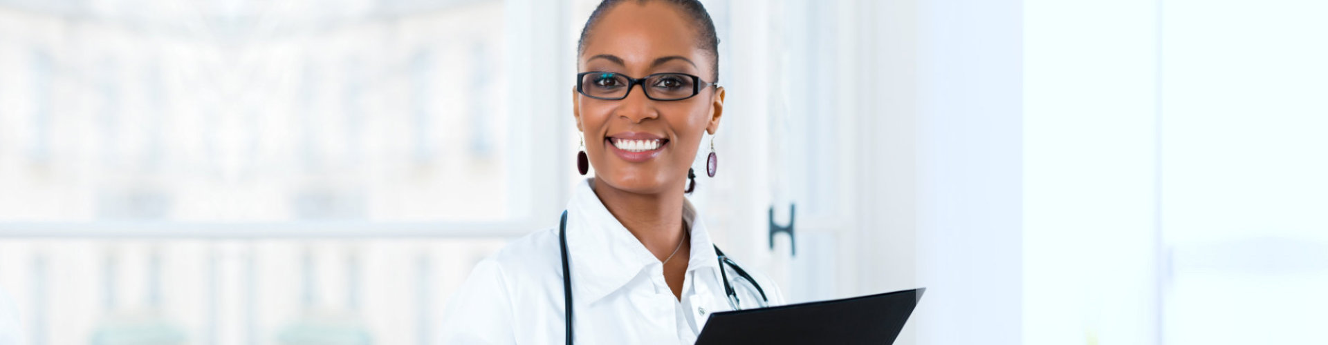 portrait of young female doctor in clinic